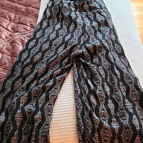 Stylish Black and White Leg Wrap Around Backless Jumpsuit - Picture 10 of 11